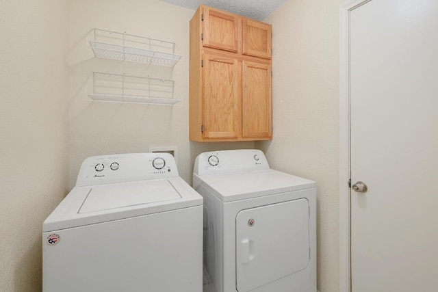 2202 Clayton Way, Cedar Park, TX 78613 - washroom with cabinet space and washer and clothes dryer