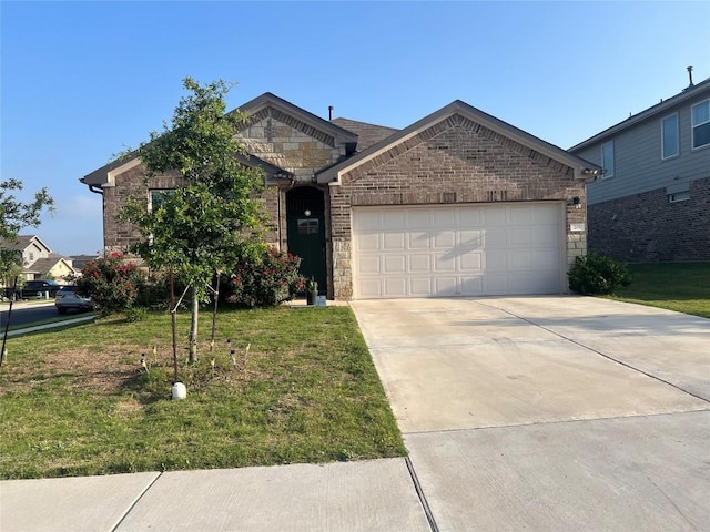 201 Abby Rd, Georgetown, TX 78626 - view of front of property with stone siding, driveway, a front lawn, a garage, and brick siding