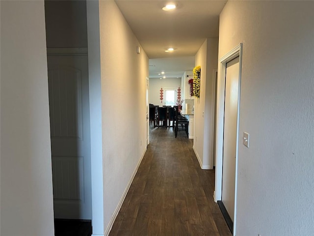 201 Abby Rd, Georgetown, TX 78626 - hallway featuring dark wood-type flooring and baseboards
