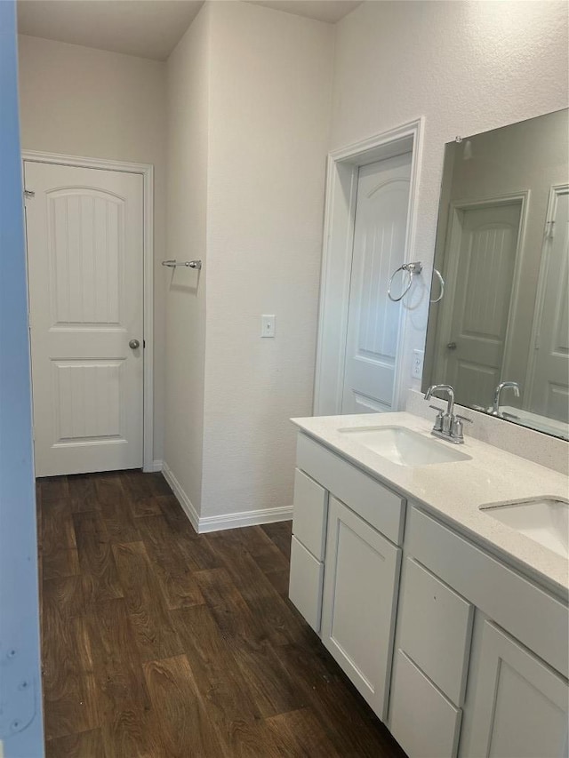 201 Abby Rd, Georgetown, TX 78626 - full bath featuring double vanity, wood finished floors, and baseboards