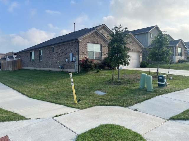 201 Abby Rd, Georgetown, TX 78626 - view of side of home with brick siding, driveway, and a garage
