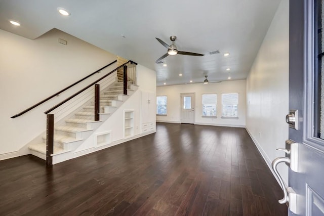 2105 Tiger Trl Unit 302, Round Rock, TX 78665 - unfurnished living room featuring a ceiling fan, wood finished floors, stairway, baseboards, and recessed lighting