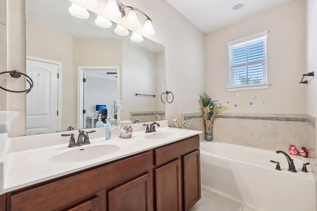 13400 Briarwick Dr Unit 1202, Austin, TX 78729 - bathroom with double vanity, a bath, and tile patterned flooring