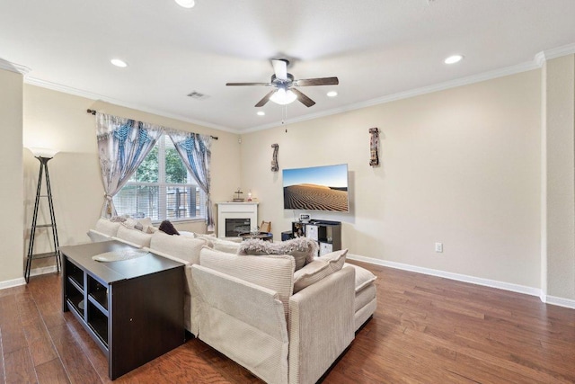 13400 Briarwick Dr Unit 1202, Austin, TX 78729 - living area with ceiling fan, dark wood-style floors, baseboards, recessed lighting, and crown molding