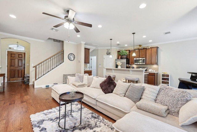 13400 Briarwick Dr Unit 1202, Austin, TX 78729 - living area with a ceiling fan, recessed lighting, ornamental molding, stairway, and dark wood-style floors
