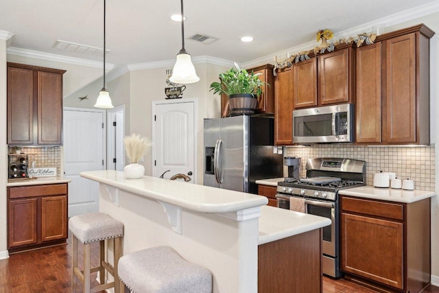 13400 Briarwick Dr Unit 1202, Austin, TX 78729 - kitchen with appliances with stainless steel finishes, ornamental molding, decorative backsplash, light countertops, and dark wood finished floors