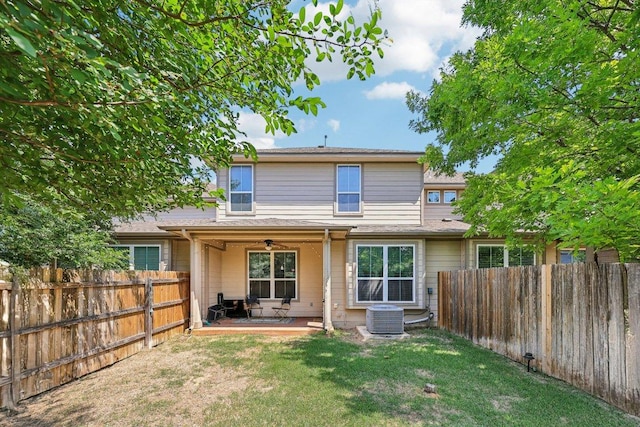 13400 Briarwick Dr Unit 1202, Austin, TX 78729 - rear view of property featuring cooling unit, a patio area, and a ceiling fan