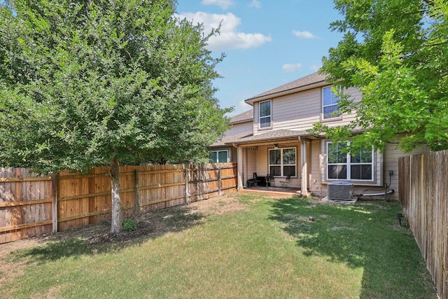 13400 Briarwick Dr Unit 1202, Austin, TX 78729 - rear view of property with cooling unit and a patio