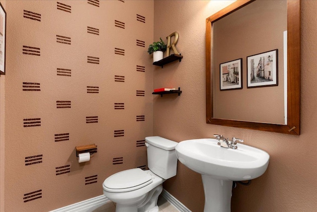 211 Joseph Dr, Buda, TX 78610 - bathroom featuring toilet and baseboards