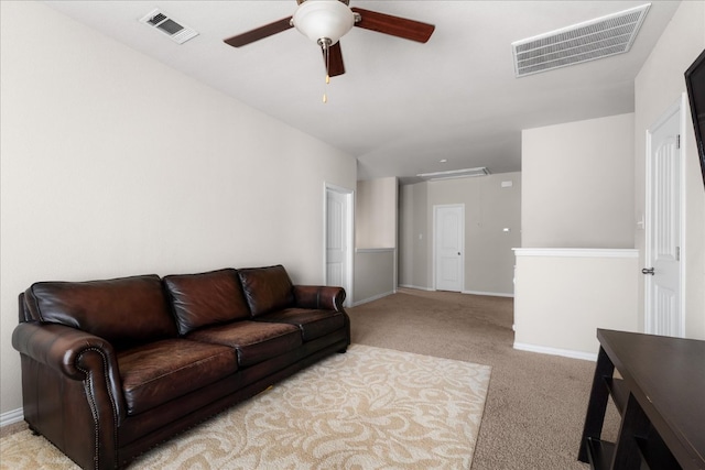 211 Joseph Dr, Buda, TX 78610 - living room with attic access, ceiling fan, carpet flooring, and baseboards
