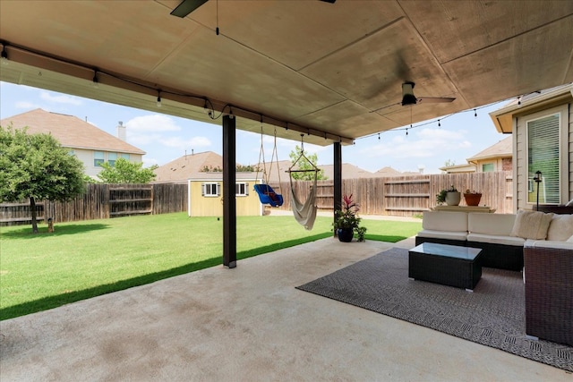 211 Joseph Dr, Buda, TX 78610 - view of patio / terrace featuring ceiling fan, an outdoor living space, and a playground