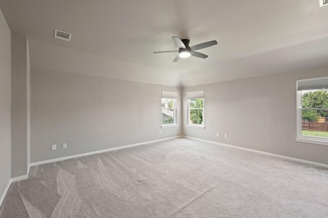 1121 Boxwood Loop, Georgetown, TX 78628 - carpeted spare room with a ceiling fan, plenty of natural light, and baseboards