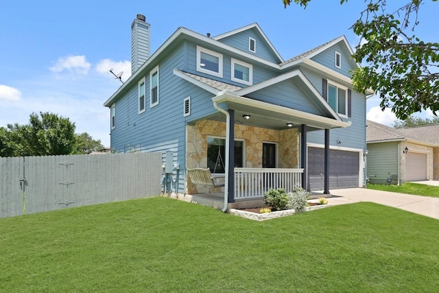 1121 Boxwood Loop, Georgetown, TX 78628 - view of front of house featuring covered porch, a chimney, driveway, a garage, and stone siding