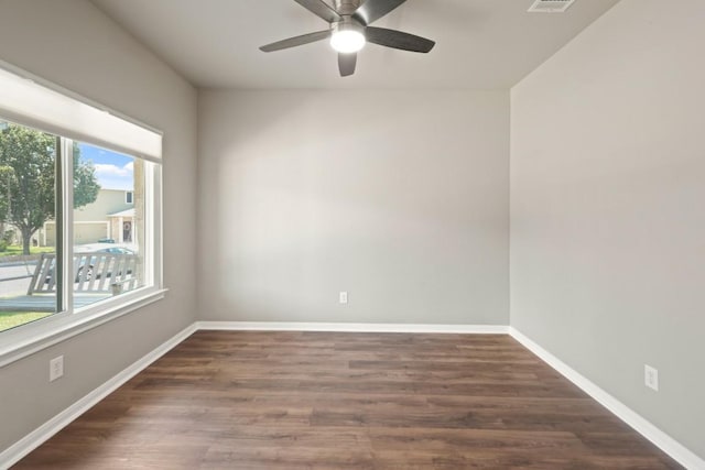 1121 Boxwood Loop, Georgetown, TX 78628 - empty room featuring wood finished floors, a ceiling fan, and baseboards