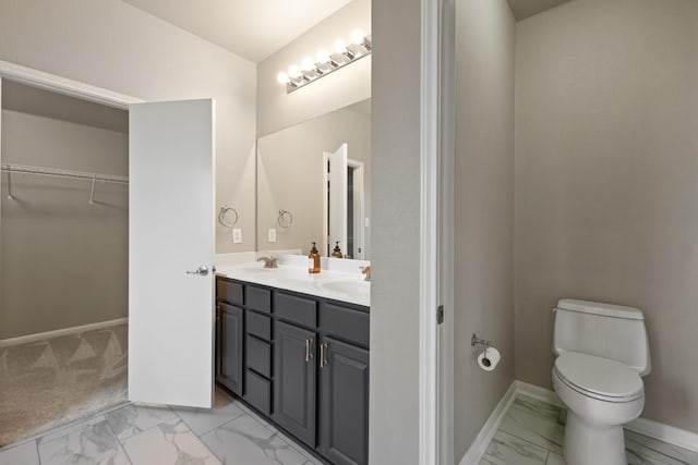 1121 Boxwood Loop, Georgetown, TX 78628 - full bathroom with marble finish flooring, double vanity, and a walk in closet