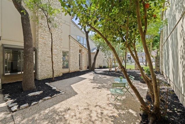8115 Raintree Pl, Austin, TX 78759 - view of yard featuring a patio