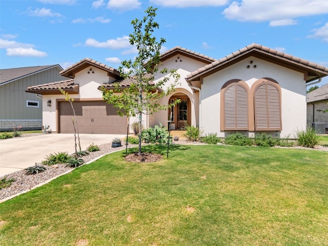 121 Wild Honeysuckle Way, San Marcos, TX 78666 - mediterranean / spanish home with concrete driveway, stucco siding, a tiled roof, and a garage