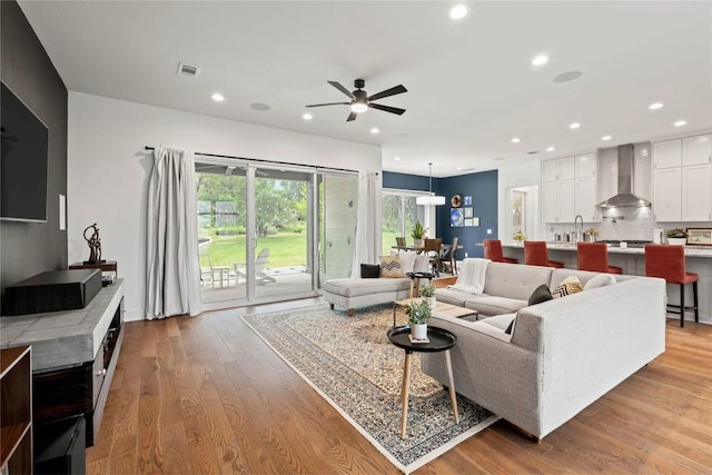 22005 Briarcliff Dr, Spicewood, TX 78669 - living room with ceiling fan, light wood-type flooring, and recessed lighting
