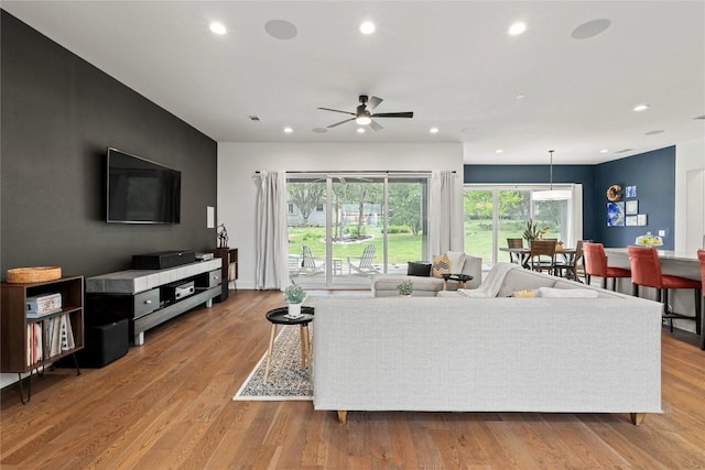 22005 Briarcliff Dr, Spicewood, TX 78669 - living area featuring a ceiling fan, recessed lighting, and light wood-style floors