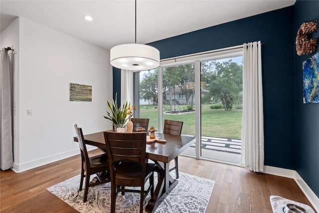 22005 Briarcliff Dr, Spicewood, TX 78669 - dining area with light wood-type flooring and recessed lighting