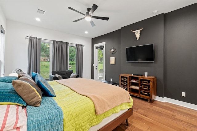 22005 Briarcliff Dr, Spicewood, TX 78669 - bedroom with access to exterior, light wood-type flooring, baseboards, ceiling fan, and recessed lighting