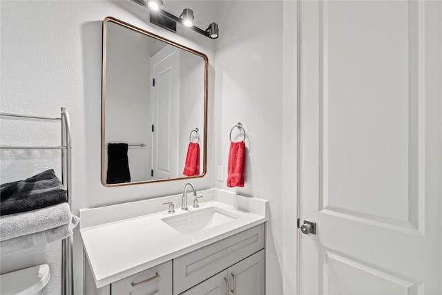 22005 Briarcliff Dr, Spicewood, TX 78669 - bathroom with vanity and toilet