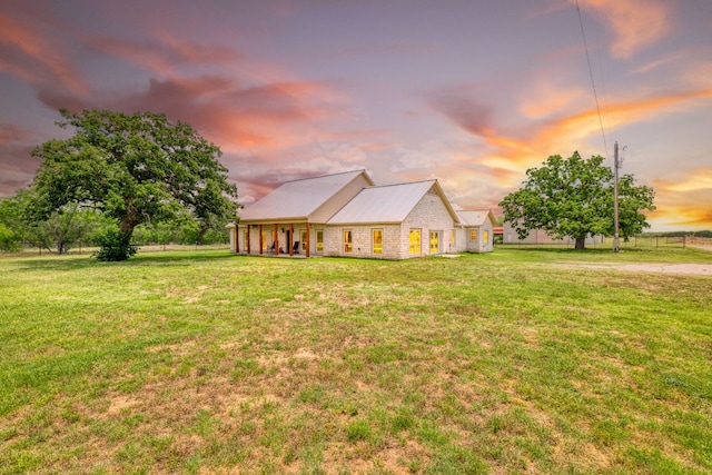 12011 Fm 1150th Rd, Luling, TX 78648 - ranch-style house with a lawn