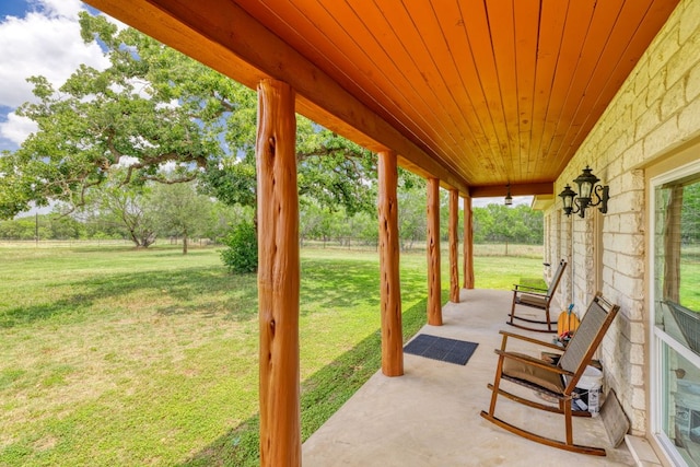 12011 Fm 1150th Rd, Luling, TX 78648 - covered porch with a lawn