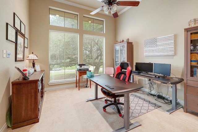 1617 High Lonesome, Leander, TX 78641 - office space featuring ornamental molding, a ceiling fan, plenty of natural light, light carpet, and a towering ceiling