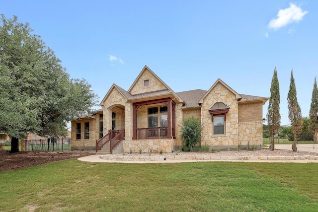 1617 High Lonesome, Leander, TX 78641 - french country home with stone siding, a standing seam roof, a porch, and metal roof
