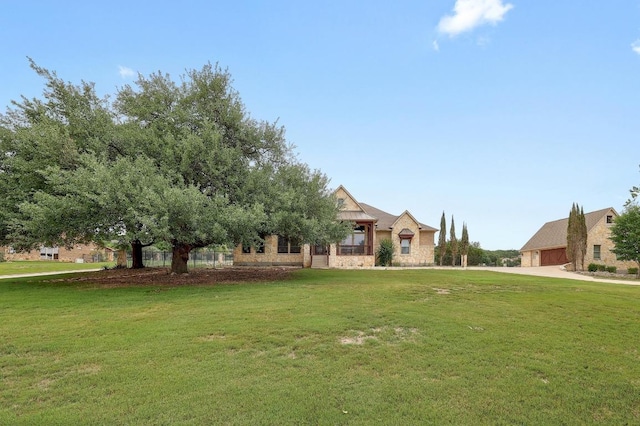 1617 High Lonesome, Leander, TX 78641 - view of front of property with a front yard and a garage