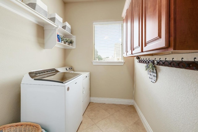 1617 High Lonesome, Leander, TX 78641 - laundry area with washer and dryer, cabinet space, baseboards, and light tile patterned floors