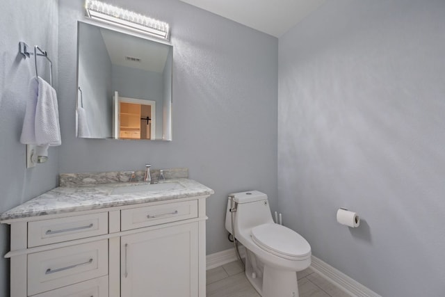 19402 Gale Meadow Dr, Pflugerville, TX 78660 - bathroom featuring vanity, toilet, and baseboards