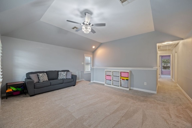 19402 Gale Meadow Dr, Pflugerville, TX 78660 - carpeted living room featuring lofted ceiling, attic access, ceiling fan, and baseboards