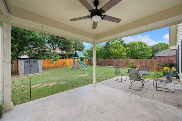 19402 Gale Meadow Dr, Pflugerville, TX 78660 - view of patio / terrace featuring outdoor dining area, ceiling fan, and a playground