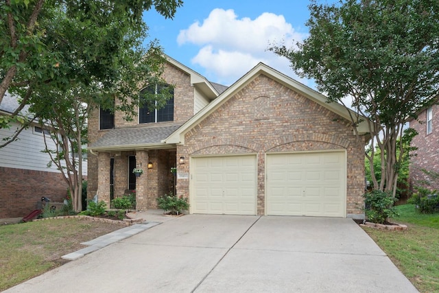 19402 Gale Meadow Dr, Pflugerville, TX 78660 - view of front of house featuring an attached garage, concrete driveway, brick siding, and a shingled roof