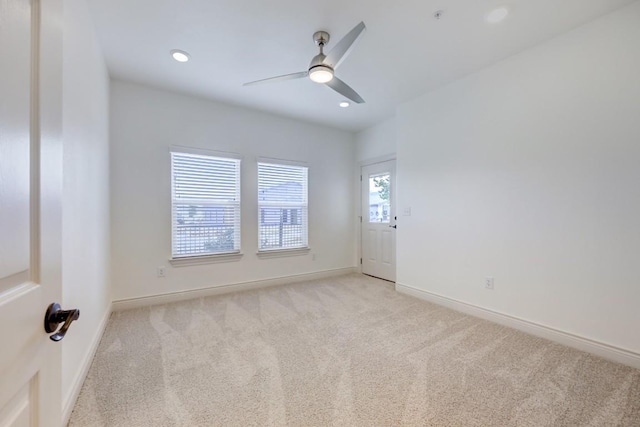 2105 Tiger Trl Unit 303, Round Rock, TX 78665 - spare room with light carpet, ceiling fan, baseboards, and recessed lighting