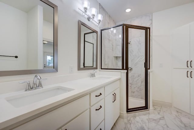 2105 Tiger Trl Unit 303, Round Rock, TX 78665 - bathroom featuring marble look tile flooring, double vanity, a marble finish shower, and recessed lighting