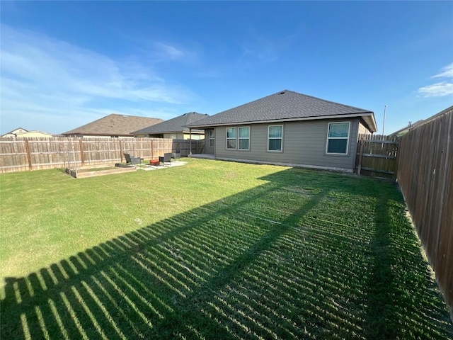 183 Beth Ann Loop, Taylor, TX 76574 - rear view of property featuring a fenced backyard