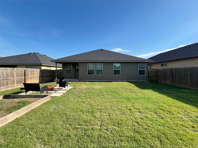 183 Beth Ann Loop, Taylor, TX 76574 - back of property with a fenced backyard and a patio area
