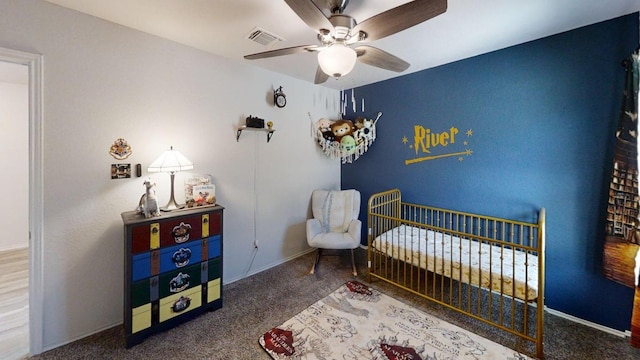 183 Beth Ann Loop, Taylor, TX 76574 - carpeted bedroom featuring a nursery area and a ceiling fan