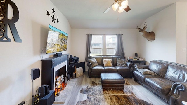 183 Beth Ann Loop, Taylor, TX 76574 - living room with wood finished floors, ceiling fan, and lofted ceiling