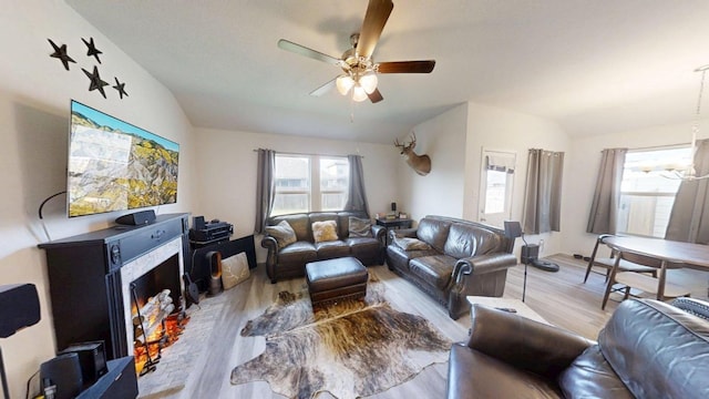 183 Beth Ann Loop, Taylor, TX 76574 - living room with wood finished floors, a ceiling fan, and lofted ceiling