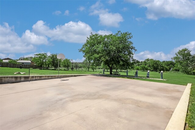 838 Pine Ln, Cottonwood Shores, TX 78657 - view of home's community featuring community basketball court and a yard