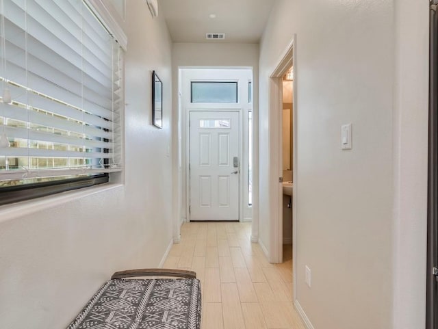 124 Cumberland Rd Unit 401, Austin, TX 78704 - entryway with baseboards and light wood-type flooring