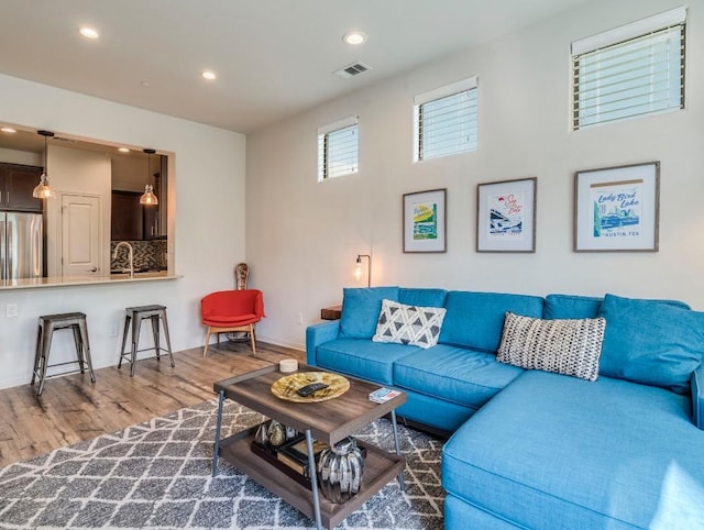 124 Cumberland Rd Unit 401, Austin, TX 78704 - living room with wood finished floors, recessed lighting, and baseboards