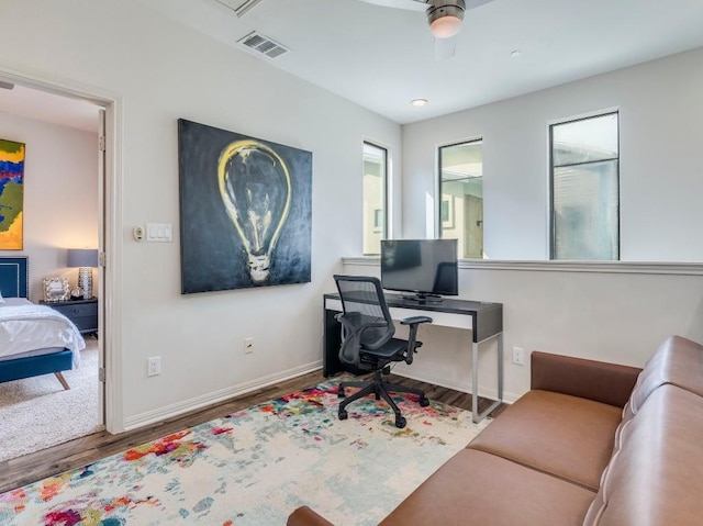 124 Cumberland Rd Unit 401, Austin, TX 78704 - home office featuring wood finished floors, baseboards, and a ceiling fan