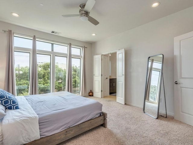 124 Cumberland Rd Unit 401, Austin, TX 78704 - bedroom featuring light carpet, recessed lighting, baseboards, and a ceiling fan