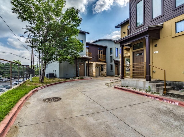 124 Cumberland Rd Unit 401, Austin, TX 78704 - exterior space with central air condition unit and stucco siding