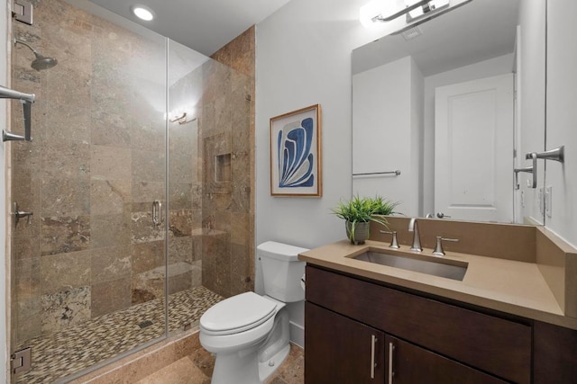 19000 Silver Maple Dr, Lago Vista, TX 78645 - full bath with toilet, vanity, a shower stall, baseboards, and recessed lighting
